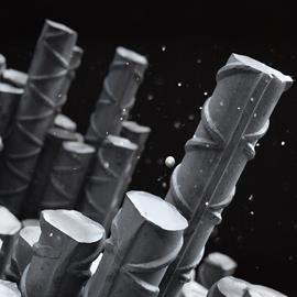 Cover image for Steel rebar and spooled rebar manufactured from steel scrap