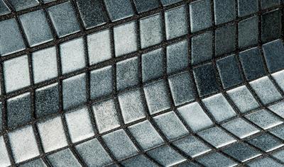 Cover image for CAPRICORN. Ezarri recycled glass mosaic tiles. Mosaico de vidrio reciclado.