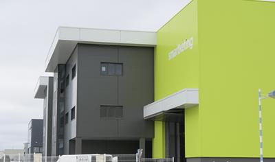 Cover image for Double skin steel faced sandwich panels with PU (polyurethane) insulation core and made of XCarb® Recycled and Renewably Produced Steel for facades.