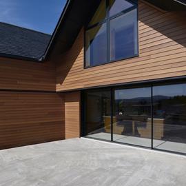 Cover image for SILA Select® Siberian Larch (Larix siberica) Profiled Cladding Coated with the Teknos Paint System